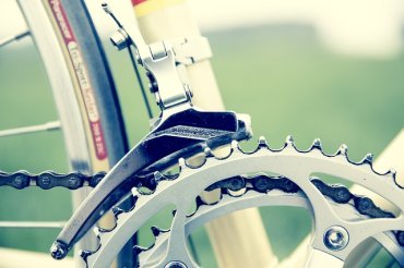 Bike chainring and front derailleur detail useful for understanding what to pack for a self-guided cycling tour in Italy